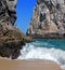 Pelican perched on Los Arcos (Land End) rock Cabo San Lucas harbor in Baja Mexico