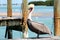 Pelican on wooden dock