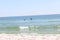 Pelicans flying over White Sand Beach