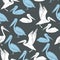 Pelicans on a gray background. Vector seamless pattern