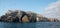 Pelicans over Anacapa Arch and Lighthouse on Anacapa Island in the Channel Islands National Park offshore from Ventura California