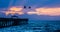 Pelicans Over the Fishing Pier