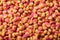 Pelleted compound fish feed background, wheatfeed pellets.