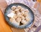 Pelmeni boiled with bay leaf, served with sour cream