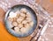 Pelmeni boiled with bay leaf, served with sour cream