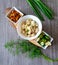 Pelmeni with butter, dill and green onions