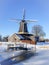 Pelmolen Ter Horst, Rijssen Netherlands during snowy weather snow covered wind mill