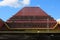 pelotas bus station, south of brazil, building of beautiful asian architecture in front of a wooded square