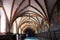 Pelplin, Poland - September 1, 2016: The cloister around an inner courtyard in the Abbey Cistercian, now the Cathedral of Pelpinie