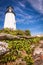 Pemaquid Point Lighthouse atop dramatic rocky coast