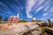 Pemaquid Point Lighthouse atop dramatic rocky coast
