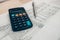 Pen and calculator on desk office. Object for calculator to calculate balance, projit, currency and cost. Accounting and