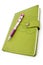 Pen and green notebook