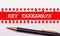 Pen and white torn paper strip on a bright red background with the text KEY TAKEAWAYS