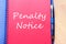 Penalty notice write on notebook