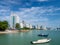 Penang  Malaysia  Georgetown. City panorama at the sea coast promenade  hotel and fishing boat view