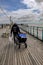 Penarth, Wales - May 21, 2017: On Penarth Pier, fisherman going