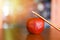 Pencil on a apple on the table in the library - Education learning on wood desk and blurred bookshelf room background