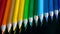 pencil colors on a black glass macro