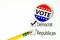 Pencil on election ballot with campaign pin