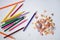 Pencil peels from sharpening and a colored pencils