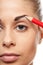 Pencil woman\'s eyebrows with a carpenters pen