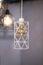 Pendant lamp geometric shape lampshade, white metal chandelier with a gold lamp inside. Design loft