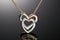 Pendant necklace two hearts entwined together