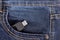 Pendrive in the pocket of blue jeans