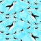 Penguin seamless pattern. Blue background. Penguins diving