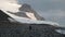 The penguin walks on pebbles on the Antarctic coast. Andreev.