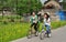 Pengzhou, Chin: Teenaged Girls Bicycling