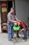 Pengzhou, China: Barber Washing Client\'s Hair