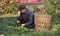 Pengzhou, China: Elderly Farmer with Wicker Basket