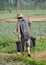 Pengzhou, China: Farmer with Water Buckets