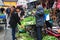 Pengzhou, China: Farmers Selling Greens at Market