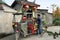 Pengzhou, China: Man Loading Tree Branches