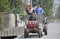 Pengzhou, China: Three Workers Riding in Truck