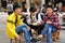 Pengzhou, China: Three Youths Eating Pineapple