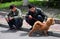 Pengzhou, China: Two Men with Dog