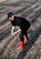 Pengzhou, China: Woman Planting Potatoes