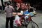 Pengzhou, China: Woman Selling Pork from Bicycle