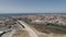 Peniche peninsula, Portugal. Skyline sprawling city against Atlantic ocean. Aerial view