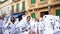 Peniscola, Spain - 06.05.19: Children in dalmatine costumes dancing, celebrating, and parading outside in carnival of