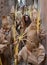 Penitents wait on queue before the start of an easter holy week procession in mallorca detail on hoods vertical