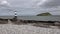 Penmon, Anglesey , Wales - April 23 2018: Penmon point lighthouse with puffin island - Wales - United Kingdom