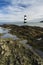 Penmon Beach, Anglesey, Wales. Lighthouse and Puffin Island.