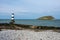 Penmon Lighthouse on Anglesey, and Puffin Island North Wales.