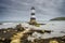 Penmon lighthouse sits at the start of the Menai Strait across from Puffin Island