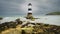 Penmon lighthouse sits at the start of the Menai Strait across from Puffin Island